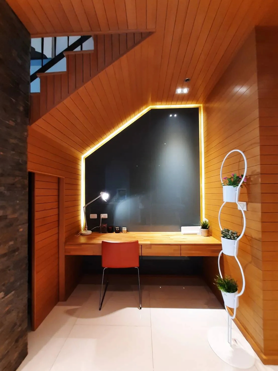 Illuminated dressing table set into timber cabinetry