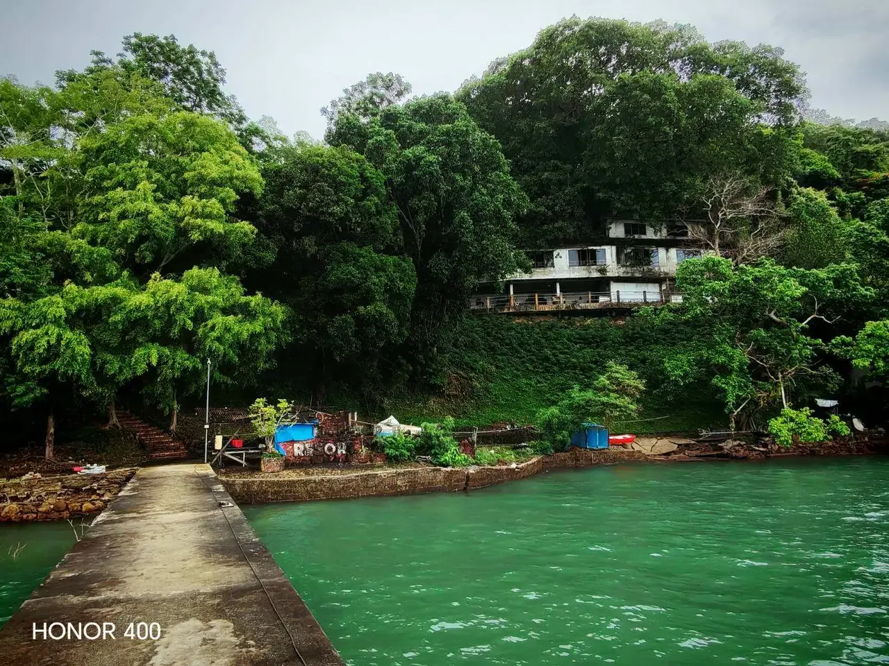 Water approach to the hillside buildings on Koh Tapao Yai