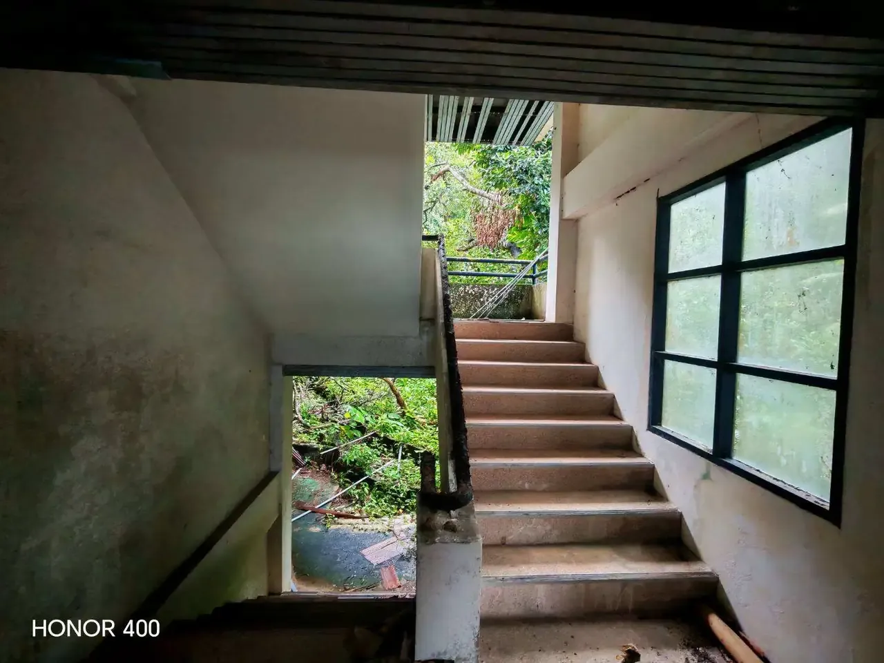 Interior staircase inside the existing accommodation building