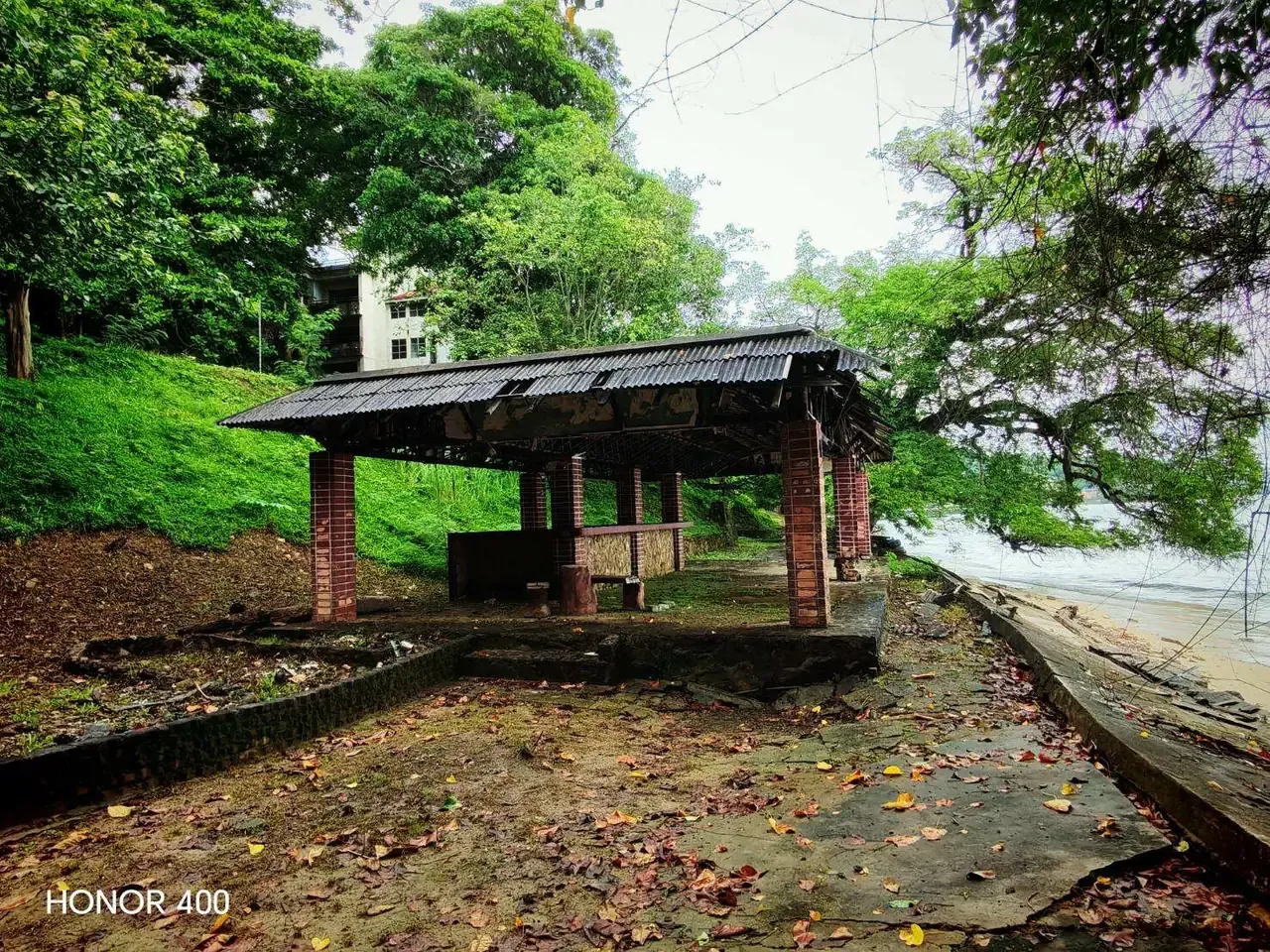 Open-sided pavilion beside the shore