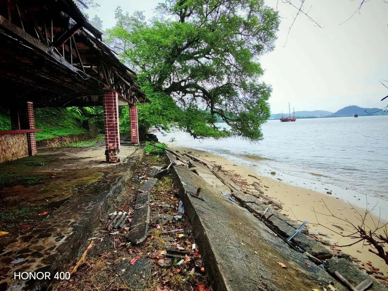 Weathered shoreline walkway facing the bay