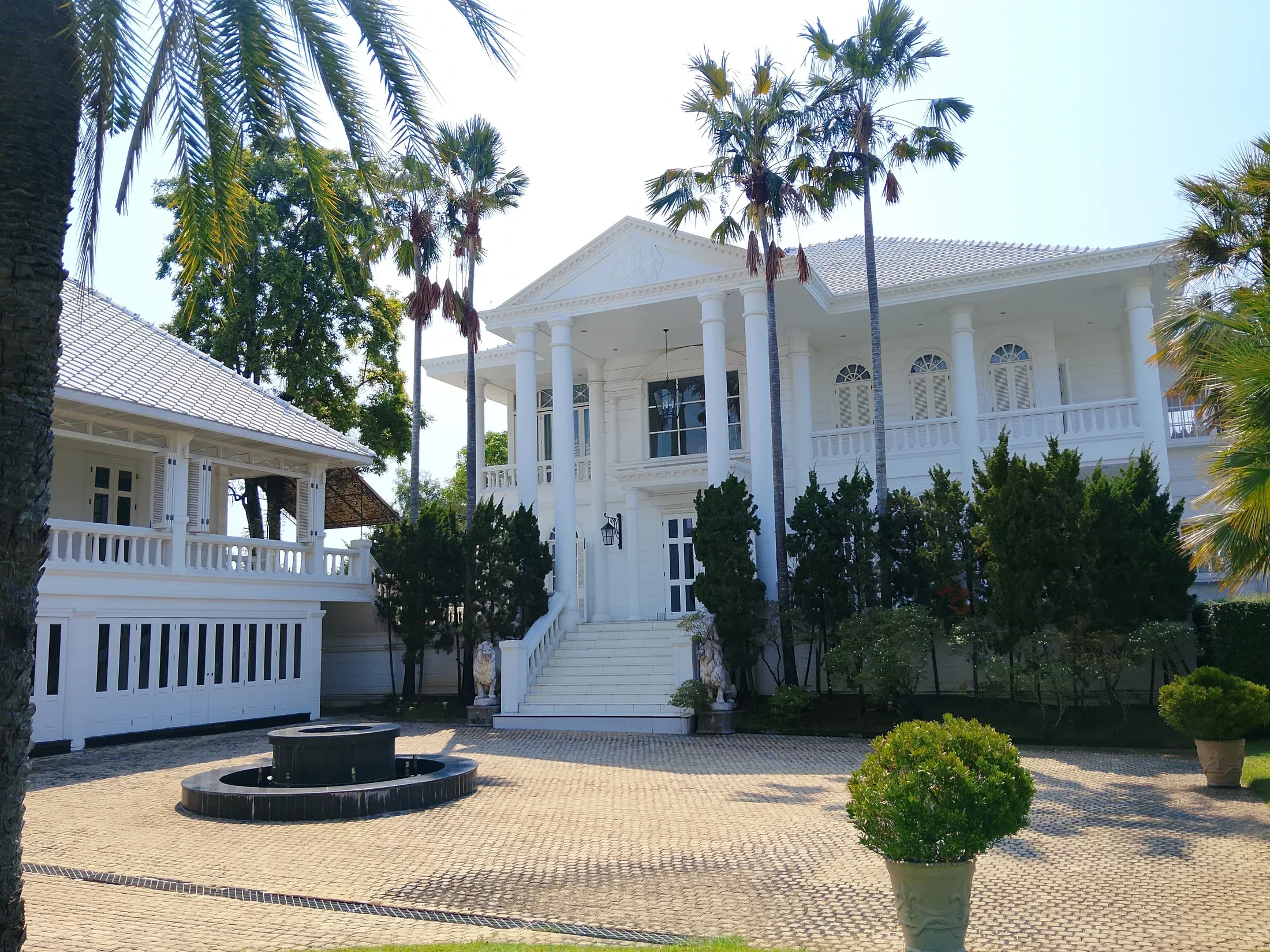 Columned main residence and adjoining guest pavilion