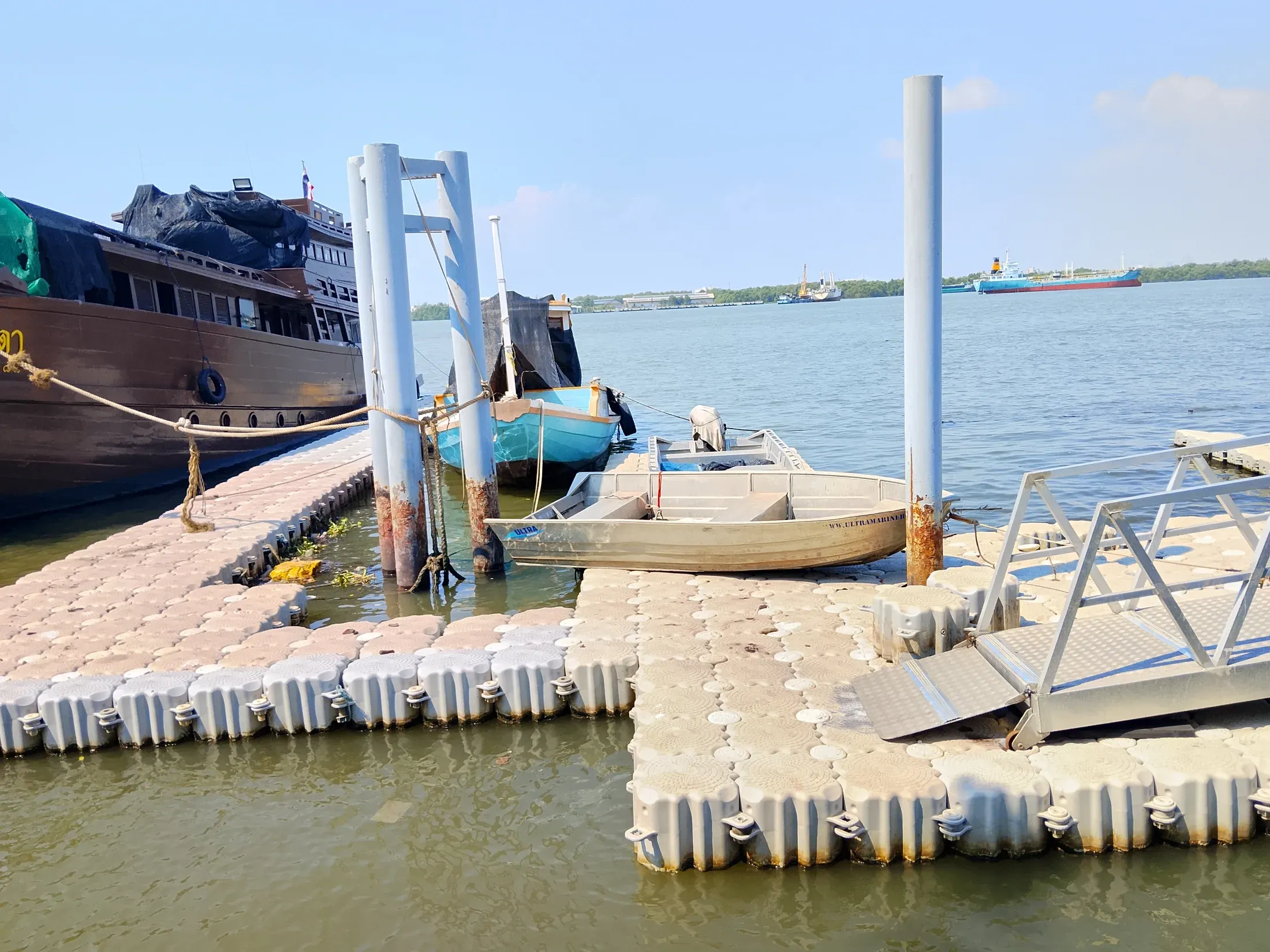 Boat lift and small craft at the waterfront